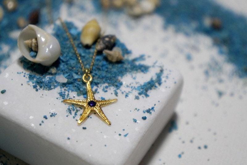 Collar con colgante de estrella de mar (chapado en oro, detalle de circonita) (Magic Dreams Collection)
