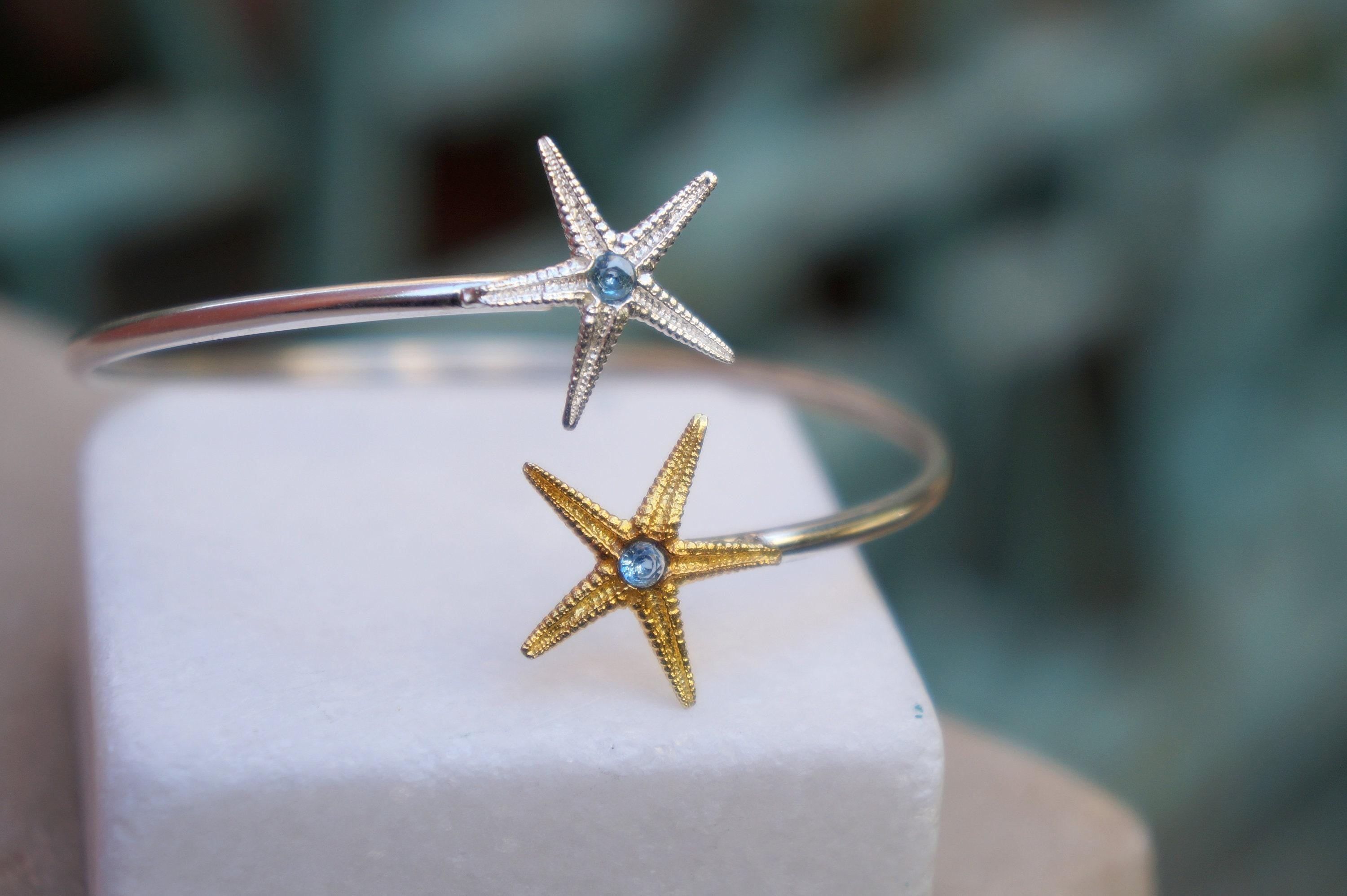 Pulsera estrella de mar en plata: brazalete ajustable con circonita azul (Magic Dreams Collection)