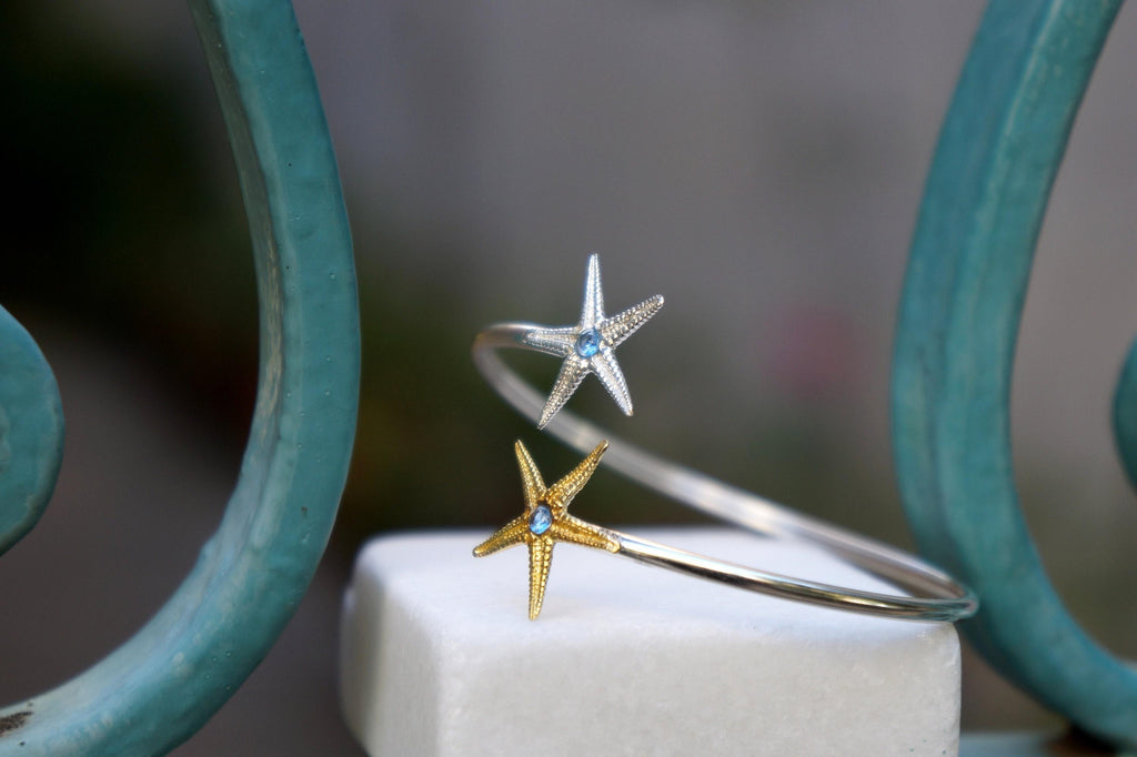 Pulsera estrella de mar en plata: brazalete ajustable con circonita azul (Magic Dreams Collection)